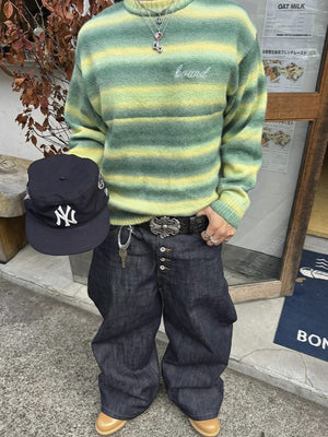 Black Embossed Belt with Cross Buckle – street photo, worn with jeans | XoKool