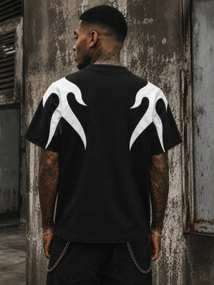Black Flame T Shirt with Stitched Panels – on model, back, street | XoKool