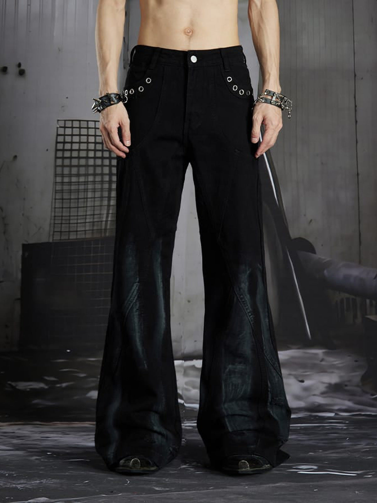 Black Flare Jeans with Eyelets and Zip Hems – on model, front | XoKool
