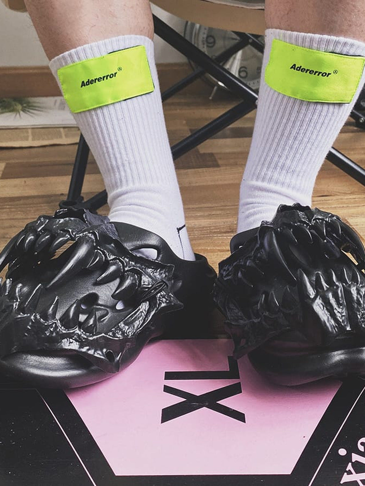 Black Gothic Clogs with Sculpted Claw Upper – Worn with white socks, front view | XoKool