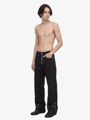 Black Grommet Jeans – on model, side | XoKool