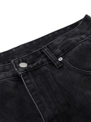 Schwarze bemalte Jeans mit blauen Colorblock-Einsätzen – Bund im Detail | XoKool