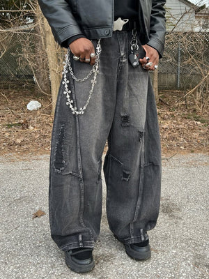 Black Ripped Barrel Jeans with Faded Wash – street photo, front close | XoKool