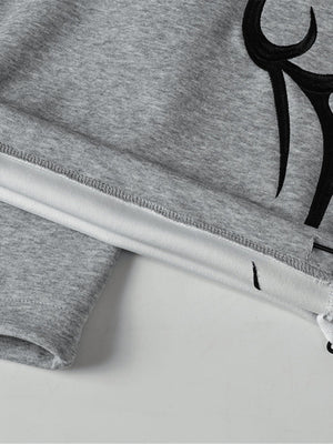 Pantalones deportivos tribales – gris, detalle del bajo con toggle | XoKool