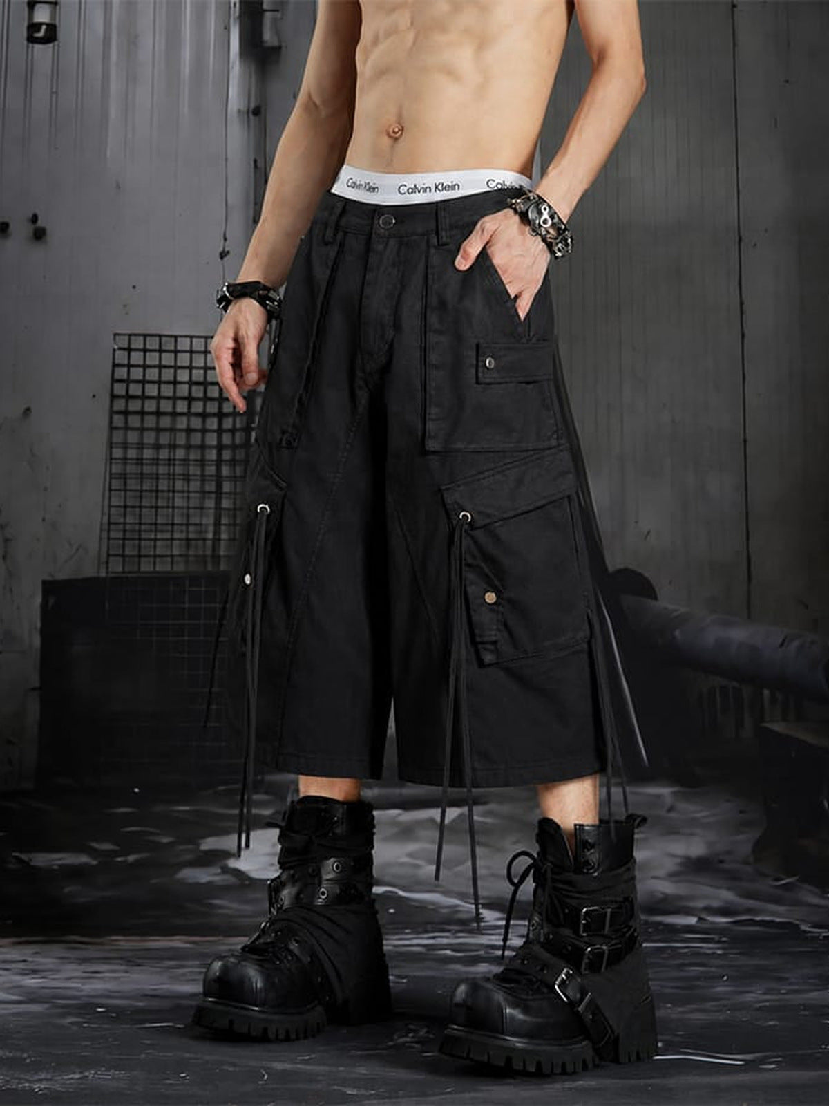 Black Wide Leg Drawstring Cargo Shorts – on model, front, hand in pocket | XoKool