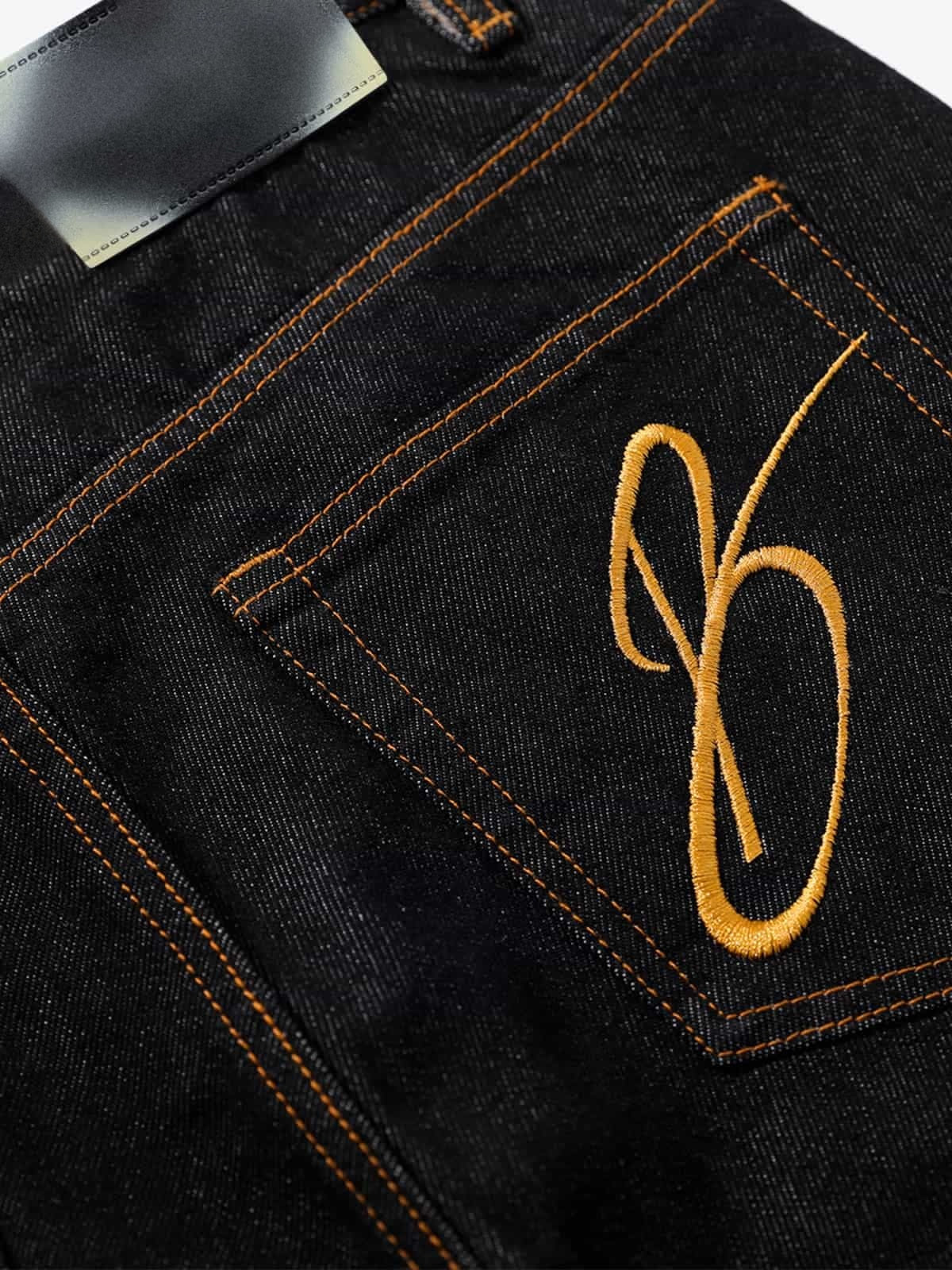 Black Wide Leg Jeans with Crossover Waist – Black, back pocket embroidery close-up | XoKool