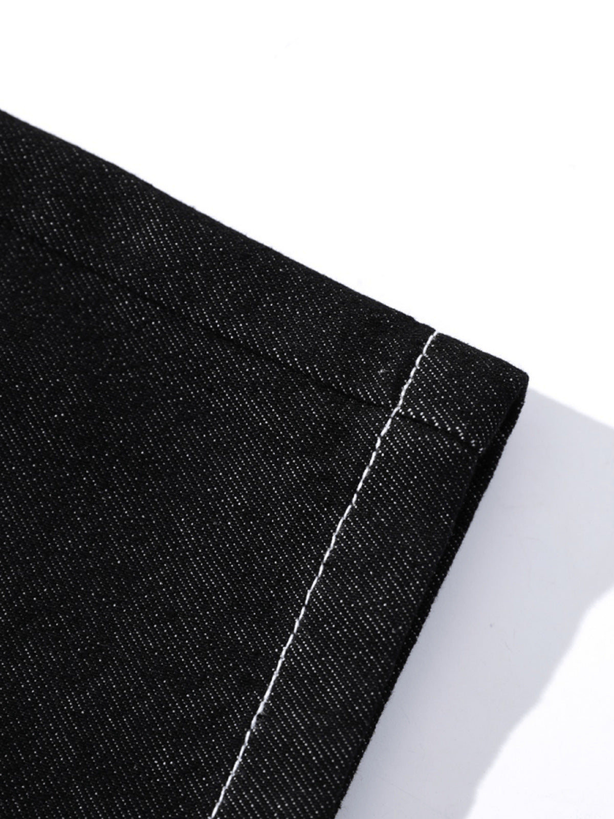 Jorts negros de pierna ancha – detalle de costuras del dobladillo | XoKool