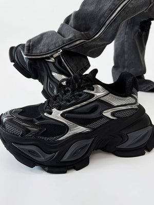 Chunky Platform Sneakers in Black and Silver – on model, angled | XoKool