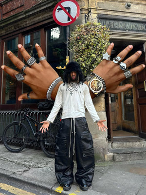 Coated Black Wide Leg Cargo Pants – Street photo, edited hands collage | XoKool