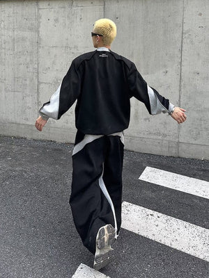 Conjunto deportivo color block – en modelo, de espalda caminando | XoKool