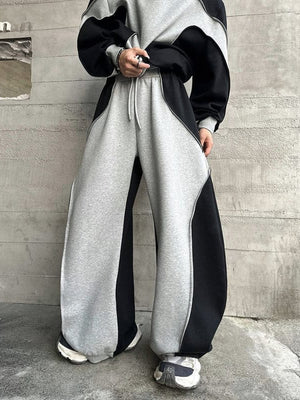 Conjunto deportivo color block – en modelo, pantalones de frente | XoKool
