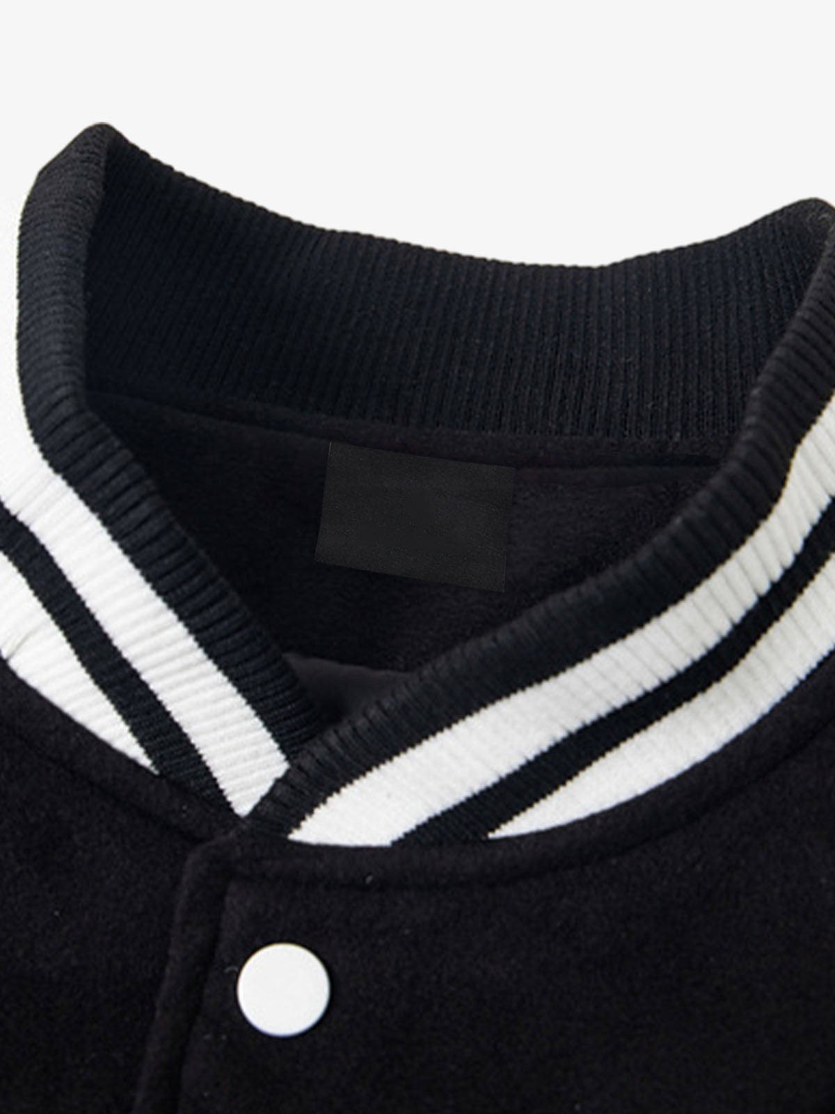 Colorblock Varsity Jacket with Leather-Look Sleeves – Black / White, collar close-up | XoKool
