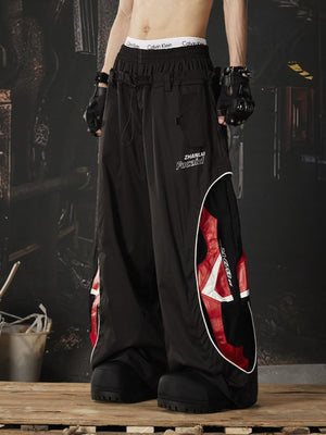 Pantalones paracaidista – negro, en modelo, lateral | XoKool