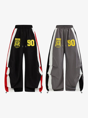 Colorblock Wide Leg Track Pants with 90 Print – Black and Grey, front views side by side | XoKool