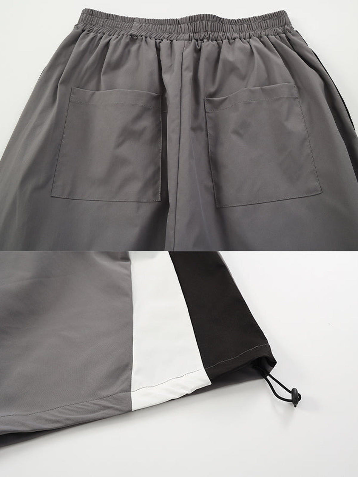 Colorblock track pants – Grey back pocket and toggle hem close-up | XoKool
