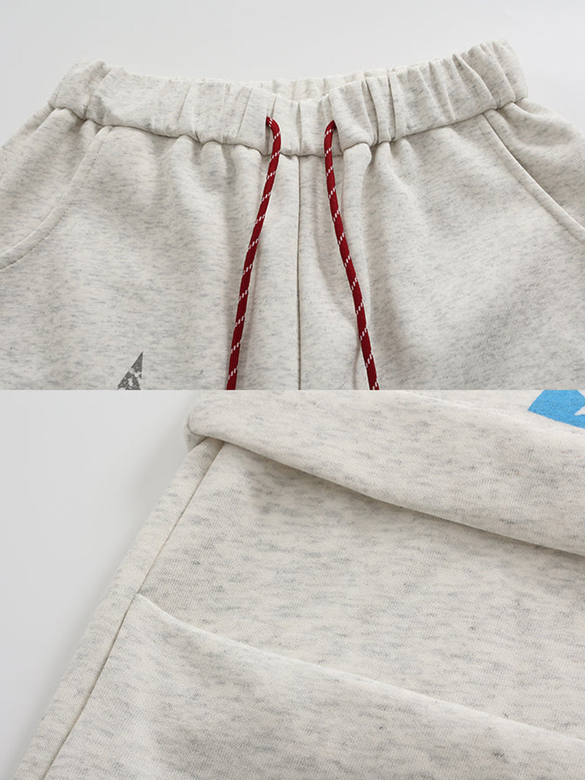 Pantalones deportivos crema con gráficos de estrella y rodeo – primer plano de la cintura con cordón y la tela | XoKool