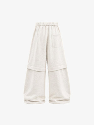 Pantalones deportivos crema con gráficos de estrella y rodeo – Avena, vista trasera | XoKool