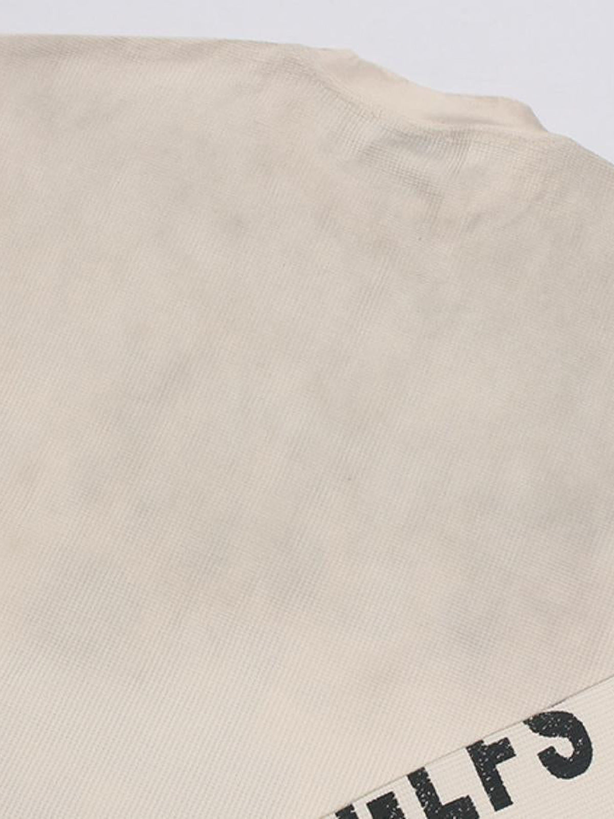Camiseta de manga larga tipo waffle – detalle del efecto lavado en el hombro | XoKool