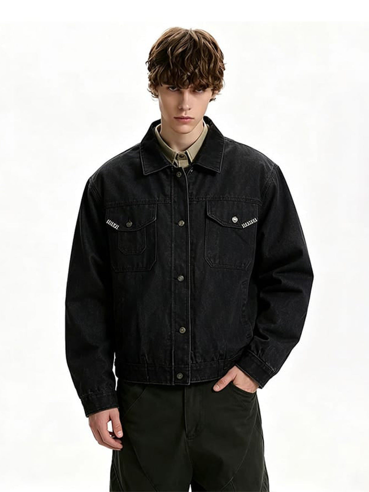 Black denim trucker jacket – on model, front | XoKool
