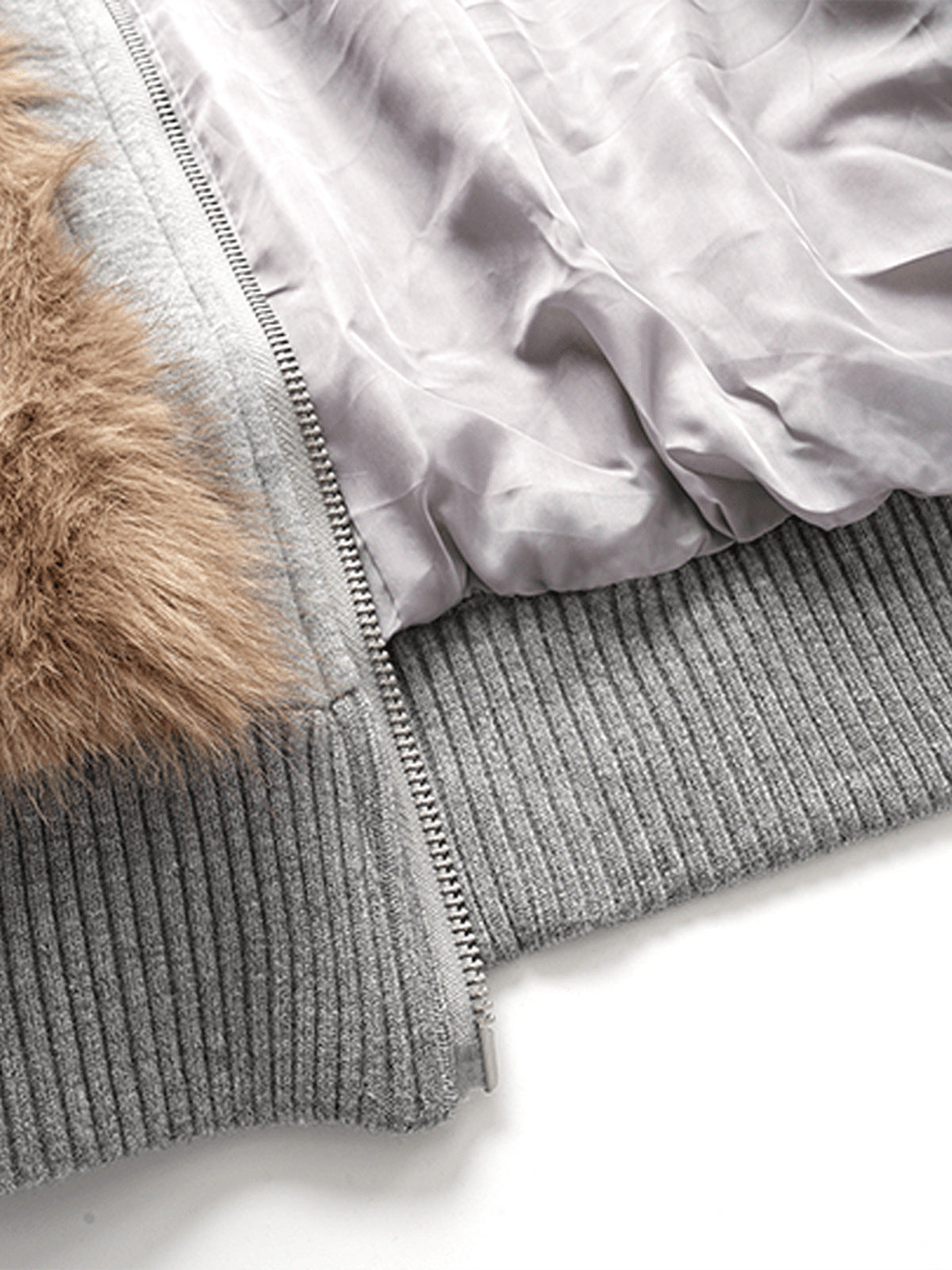 Faux fur hooded jacket – lining and ribbed hem close-up | XoKool