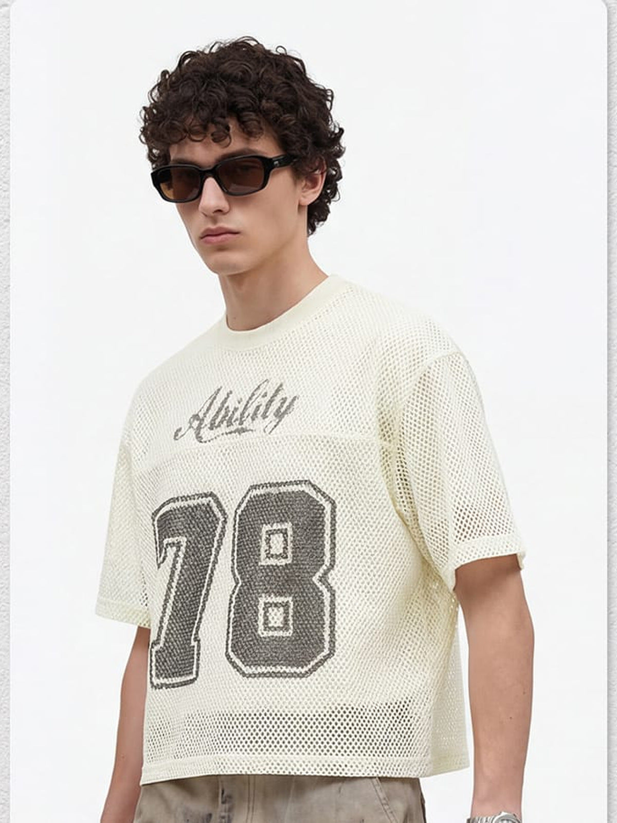 Cropped Mesh Football Jersey with Distressed Number – On model, cream round neck | XoKool