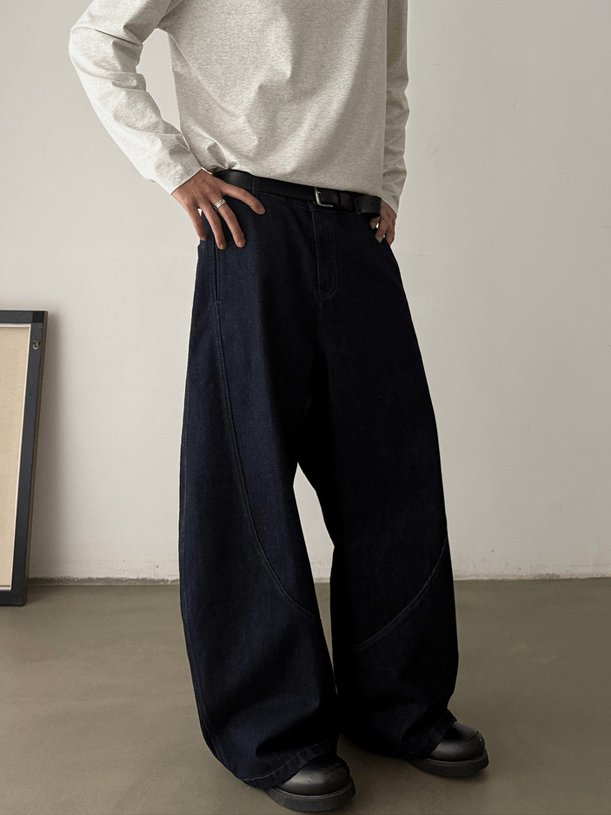 Dark Indigo Barrel Leg Jeans with Curved Seams – on model front | XoKool