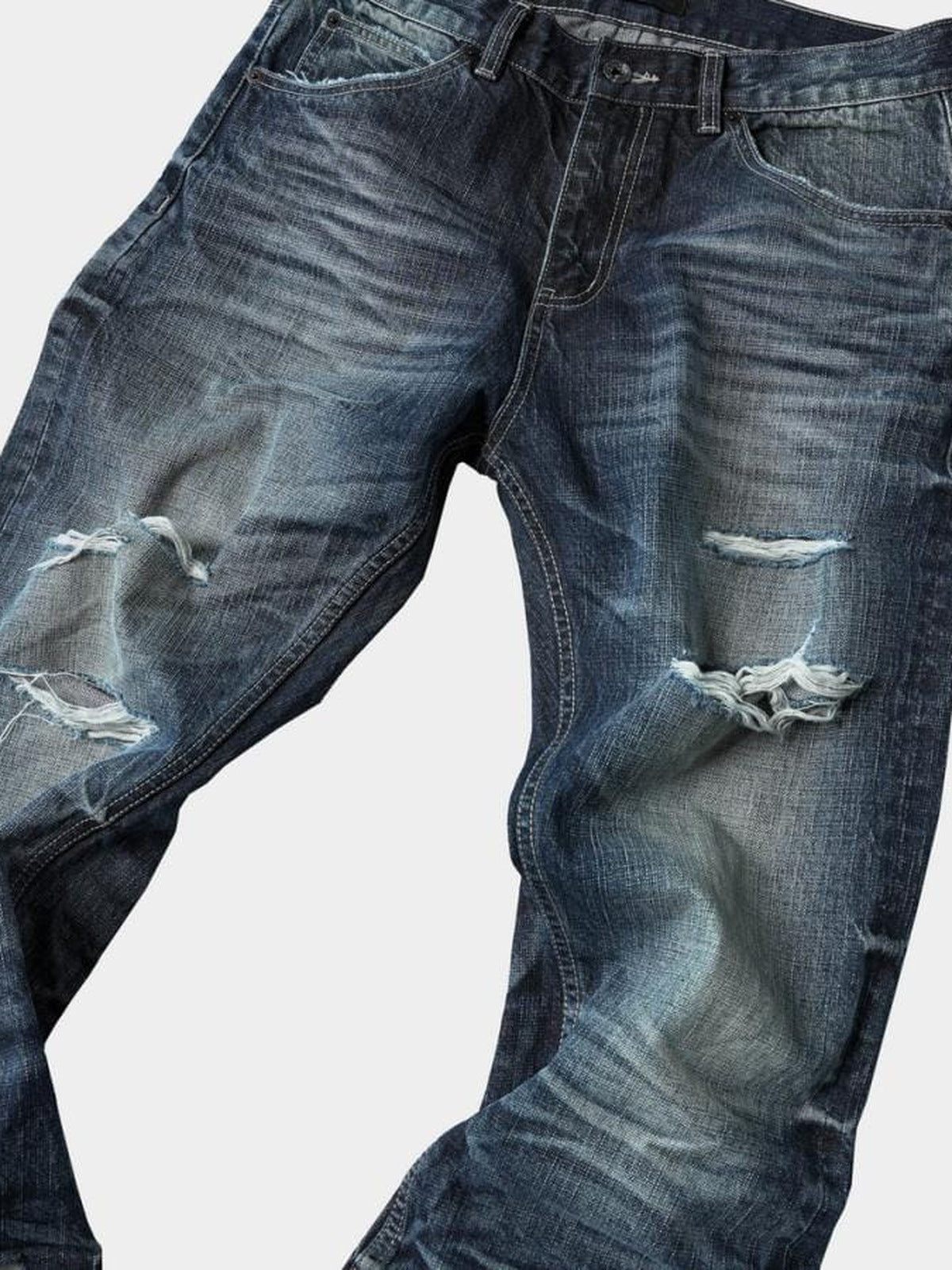 Jeans de pierna ancha desgastados – detalle de los rotos delanteros | XoKool
