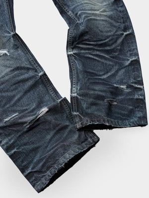 Jeans de pierna ancha desgastados – detalle de la pierna y el dobladillo | XoKool