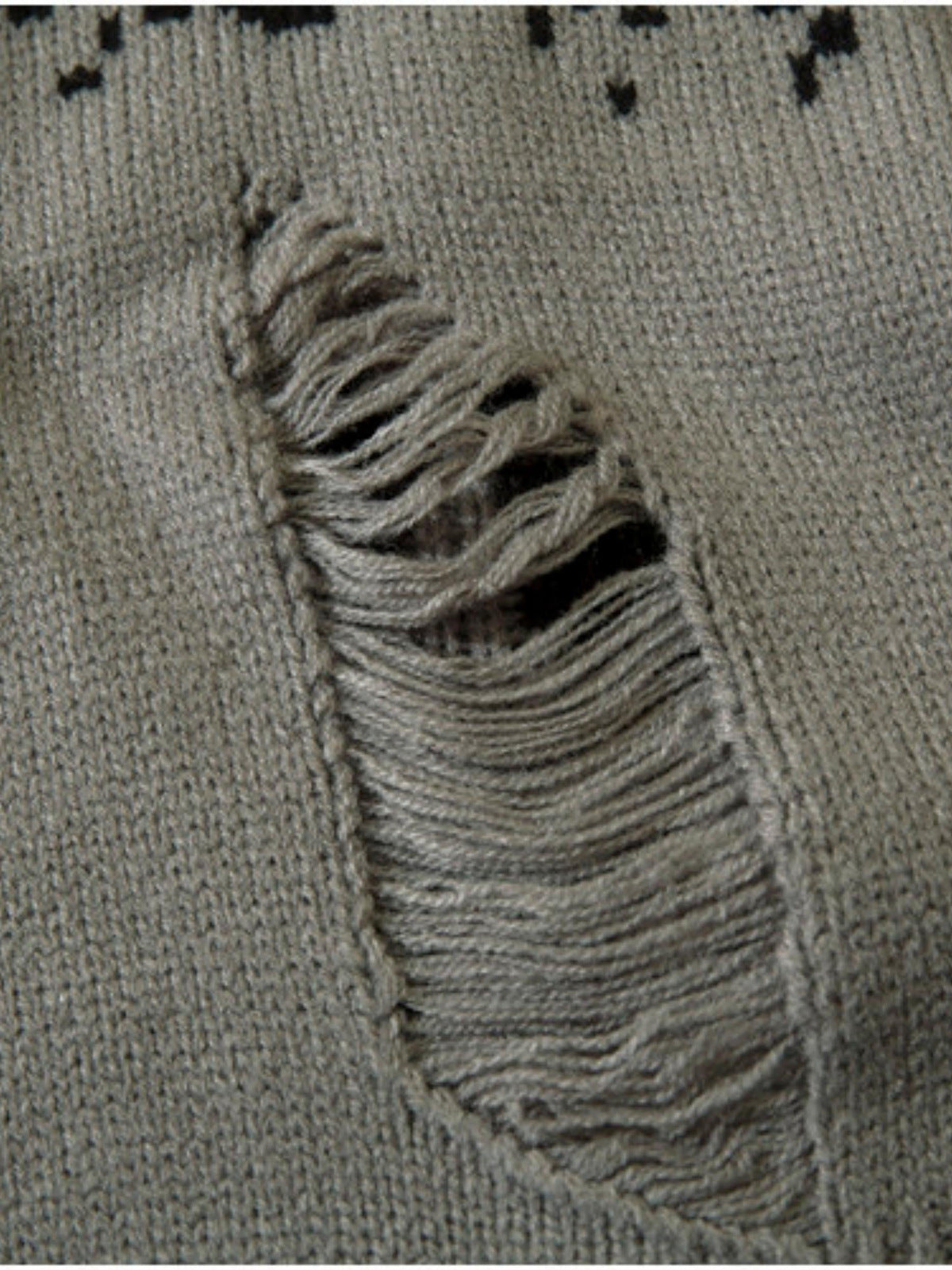 Face jacquard sweater – ladder rip close-up | XoKool