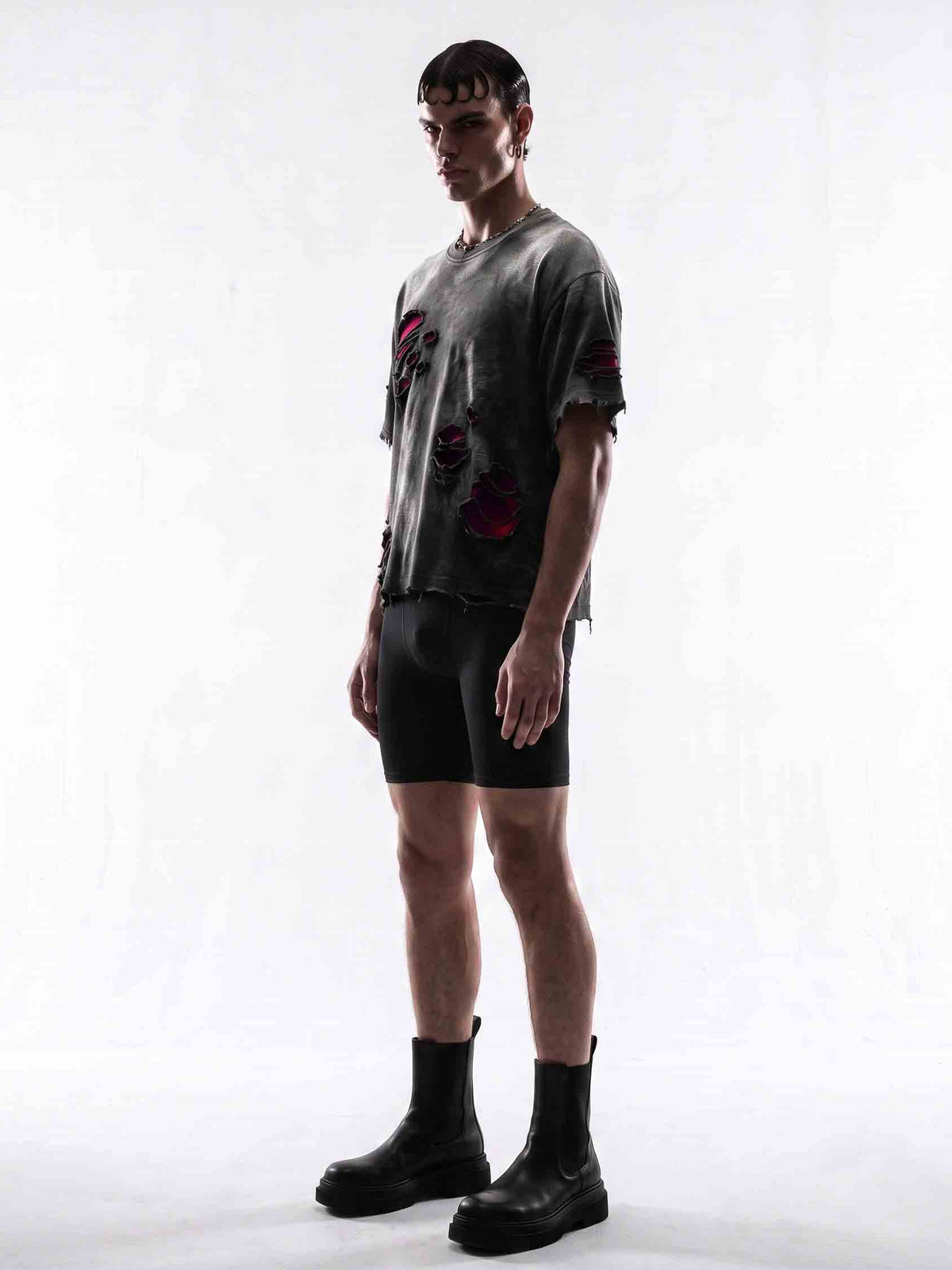 Distressed Oversized Tee with Red Underlayer – on model, side | XoKool