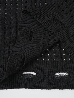 Strickweste mit Stern – Distressed-Saum Nahaufnahme | XoKool