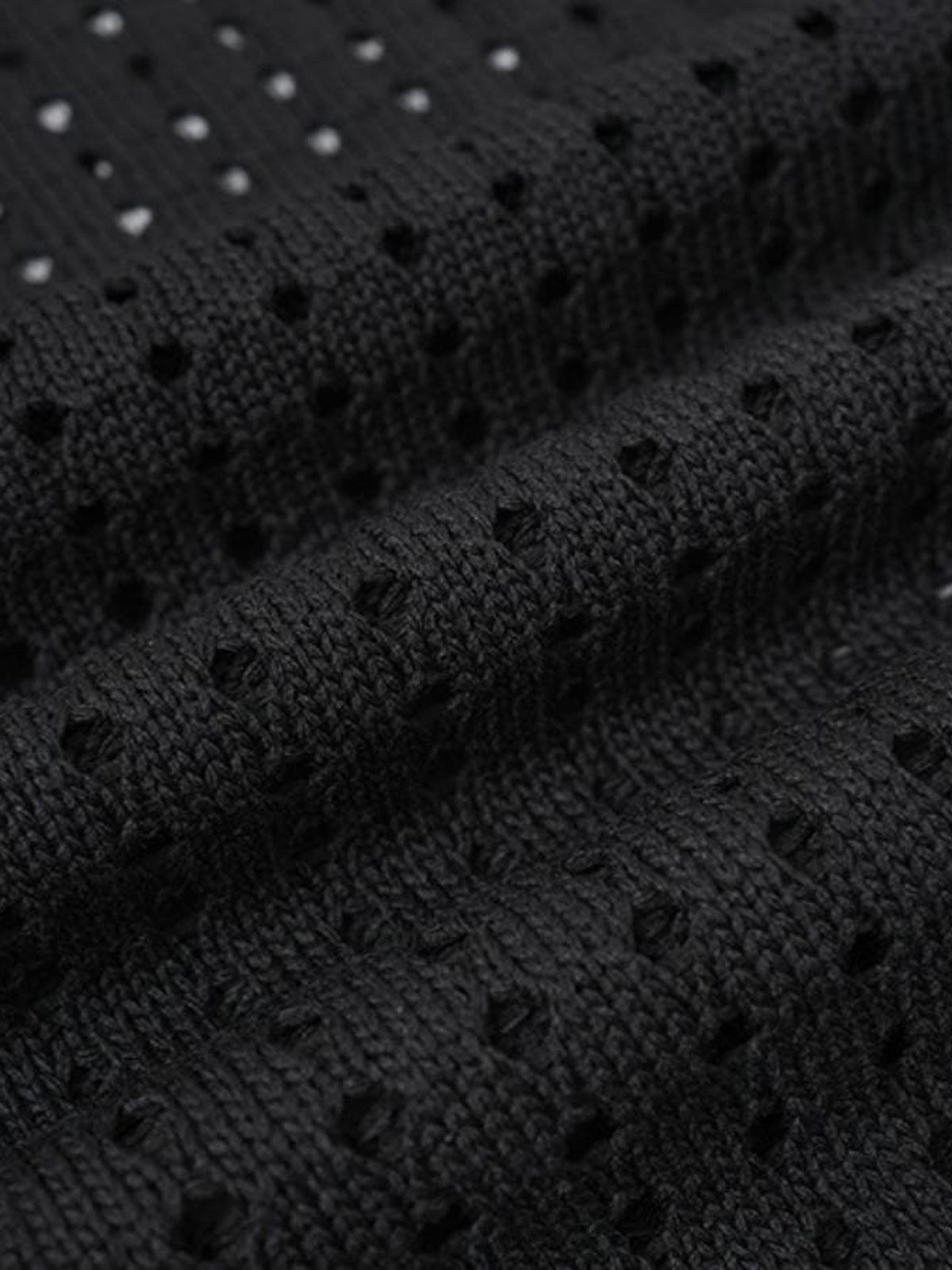 Strickweste mit Stern – offene Strickstruktur Nahaufnahme | XoKool
