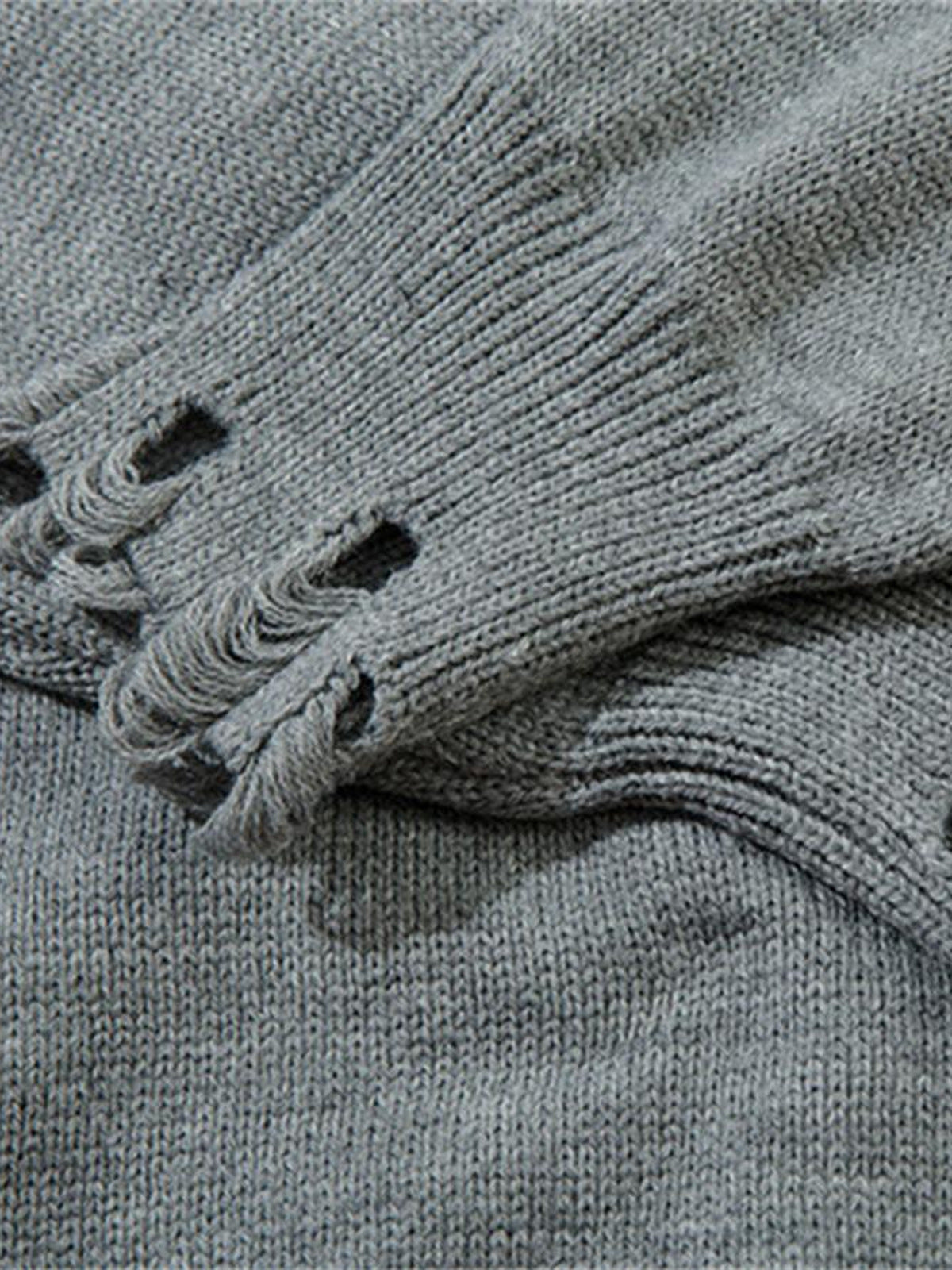Distressed Strickpullover – Grau, Nahaufnahme der Löcher am Bündchen | XoKool