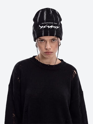 Distressed Thorn Embroidered Rib Knit Beanie – on model (woman), front | XoKool