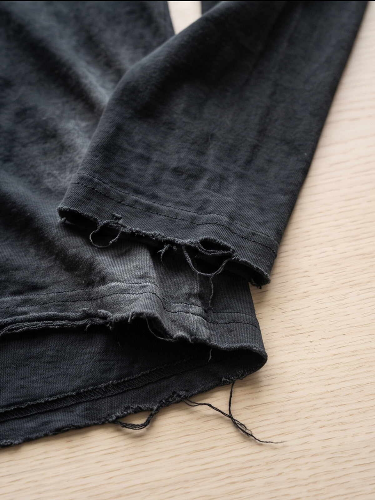 Distressed layered tee – frayed hem close-up | XoKool