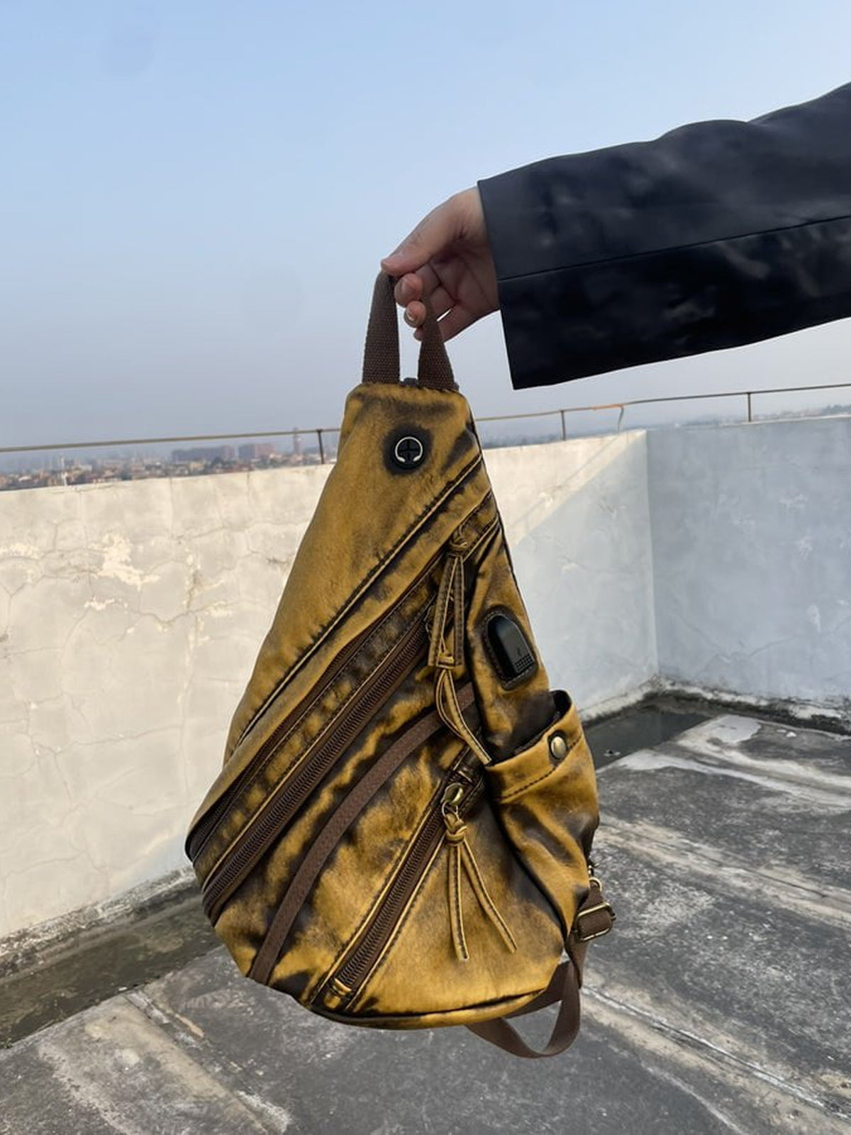 Washed sling bag – Yellow, held in hand (near-duplicate of 2) | XoKool