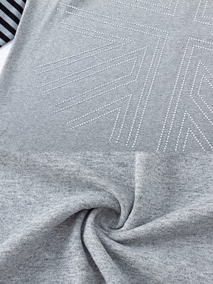 Layered striped hoodie – dotted graphic and fabric close-up | XoKool