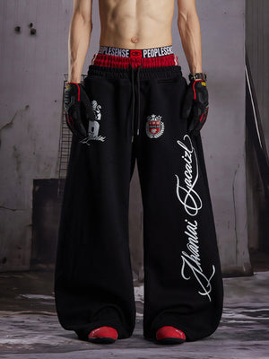 Lion Graphic Sweatpants – on model, Black front | XoKool