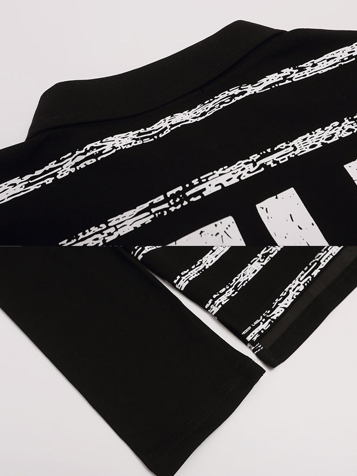 Layered long sleeve polo – collar and print close-up | XoKool