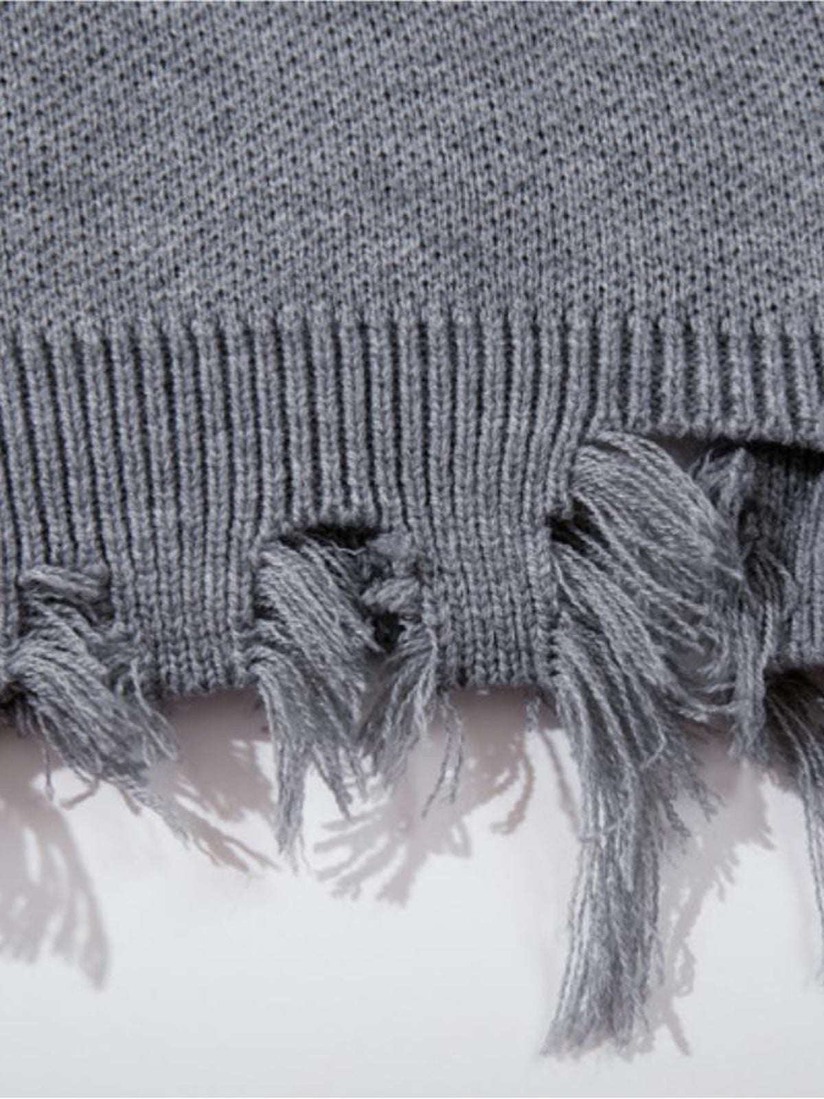 Gothic script sweater – Grey, frayed hem close-up | XoKool