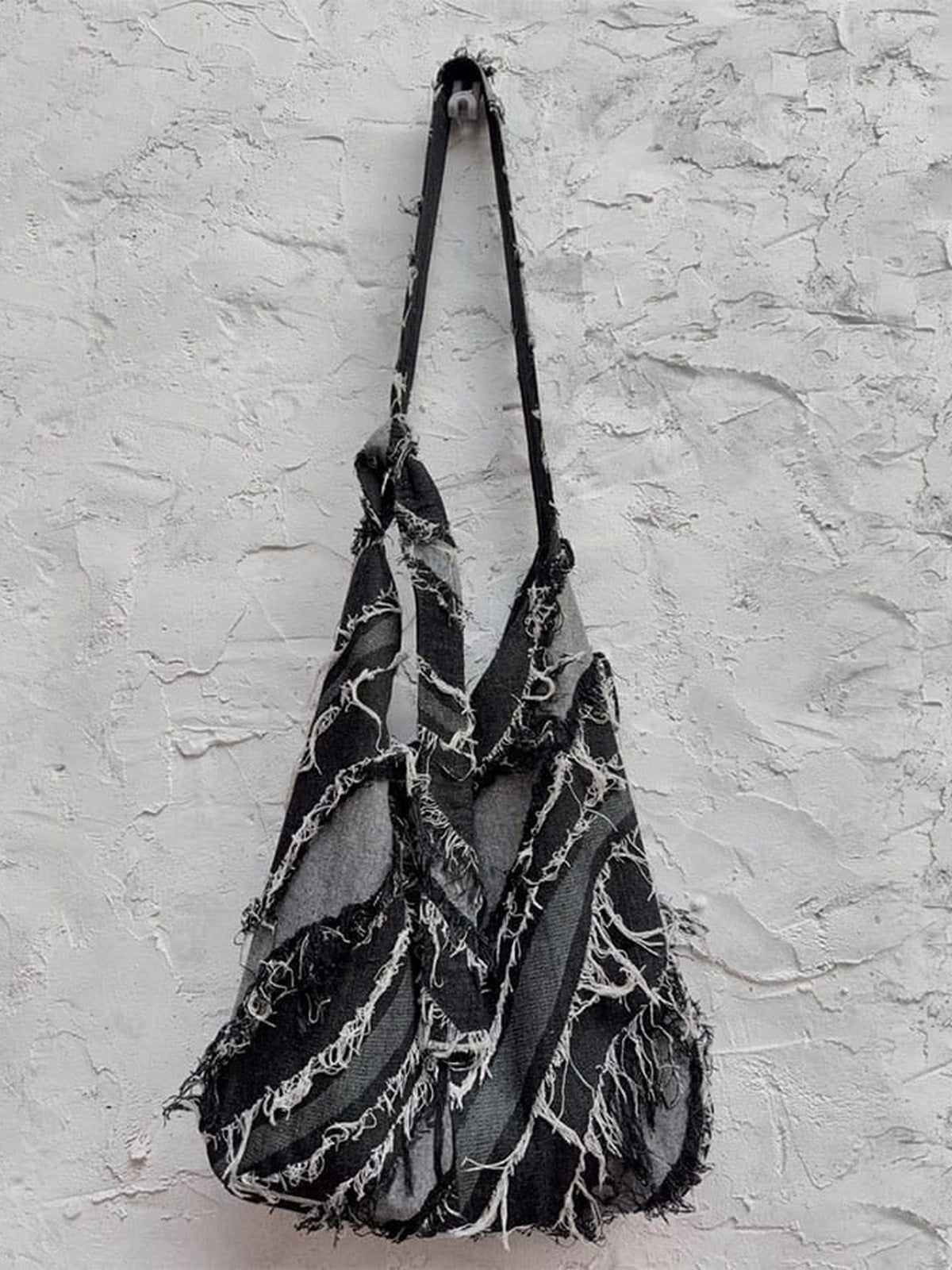 Frayed Patchwork Denim Hobo Shoulder Bag – Bag hanging on wall | XoKool