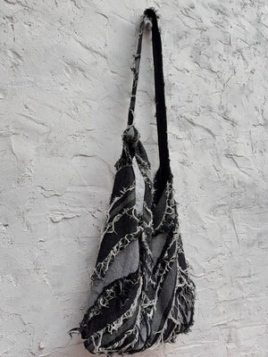 Denim shoulder bag – Bag hanging, side view | XoKool