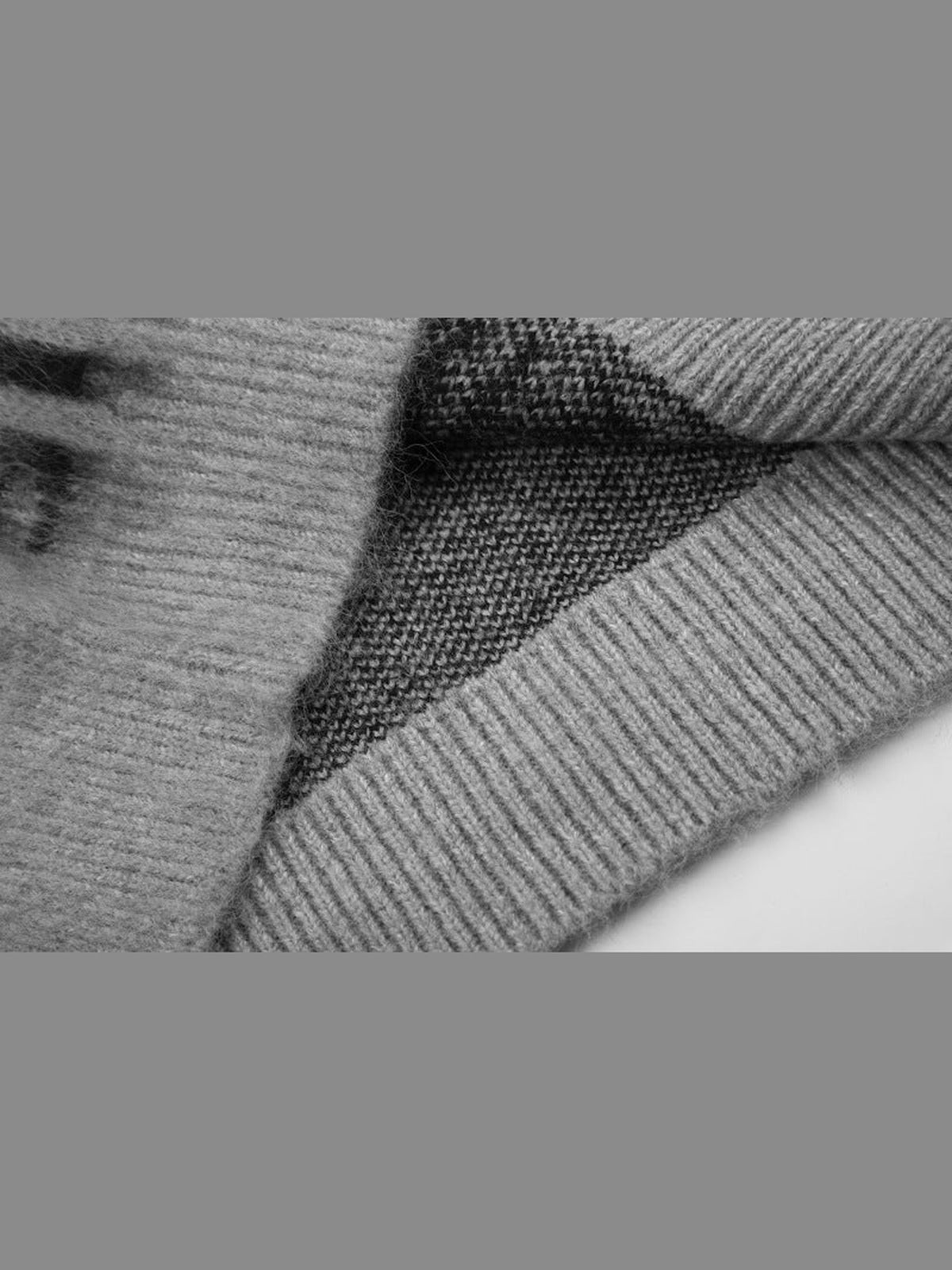 Cárdigan con cierre y silueta – gris, detalle del dobladillo acanalado y del interior | XoKool