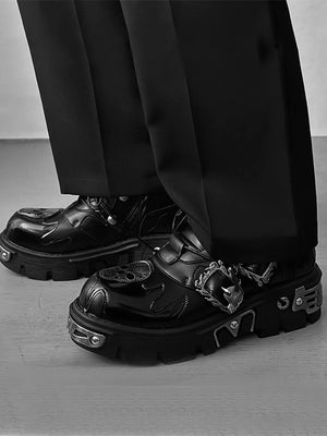 Gothic Platform Shoes with Flame Buckle and Metal Plates – On model, black, side view | XoKool