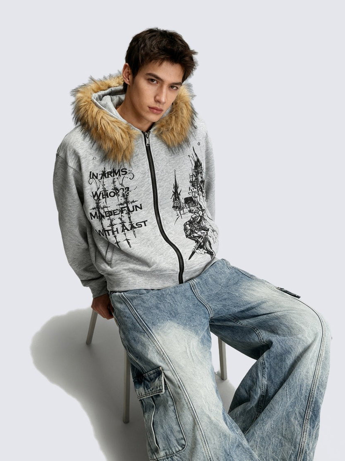 Gothic Print Zip Up Hoodie with Faux Fur Hood – Heather grey, on model, sitting | XoKool