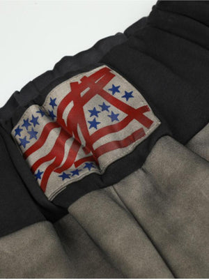 Gradient sweatpants – Waistband flag patch close-up | XoKool