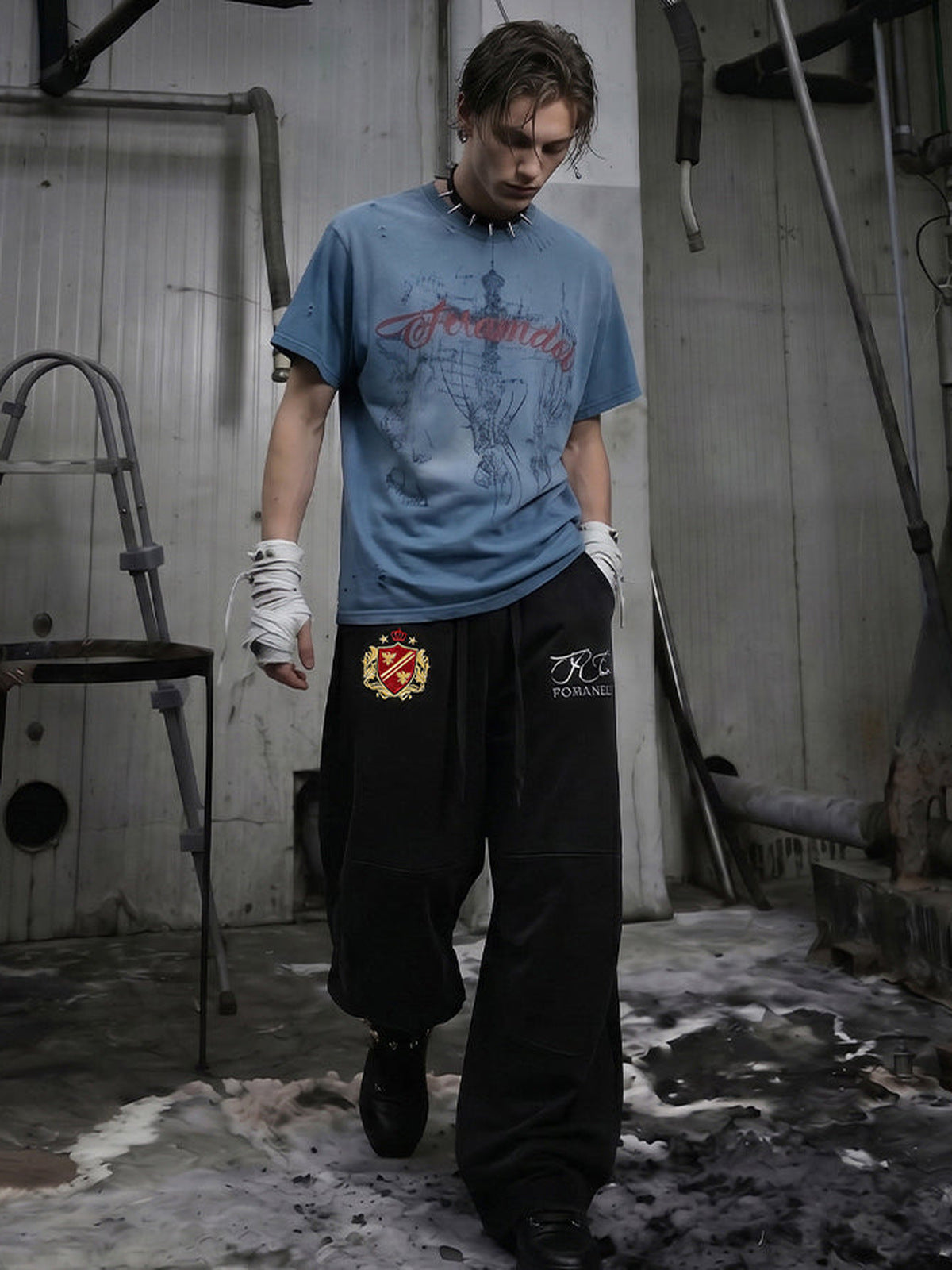 Embroidered sweatpants – Black, on model with blue tee | XoKool