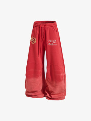 Embroidered sweatpants – Red, angled view | XoKool