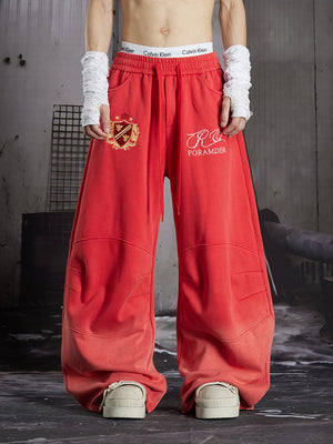 Embroidered sweatpants – Red, on model, front close | XoKool