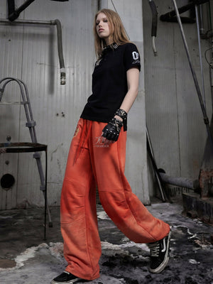 Embroidered sweatpants – Red, on model, walking | XoKool